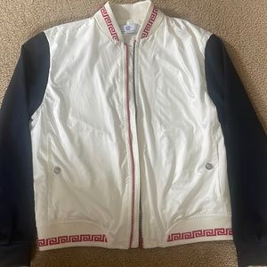 Young Versace. Back has Versace symbol that doesn’t show well in the photo